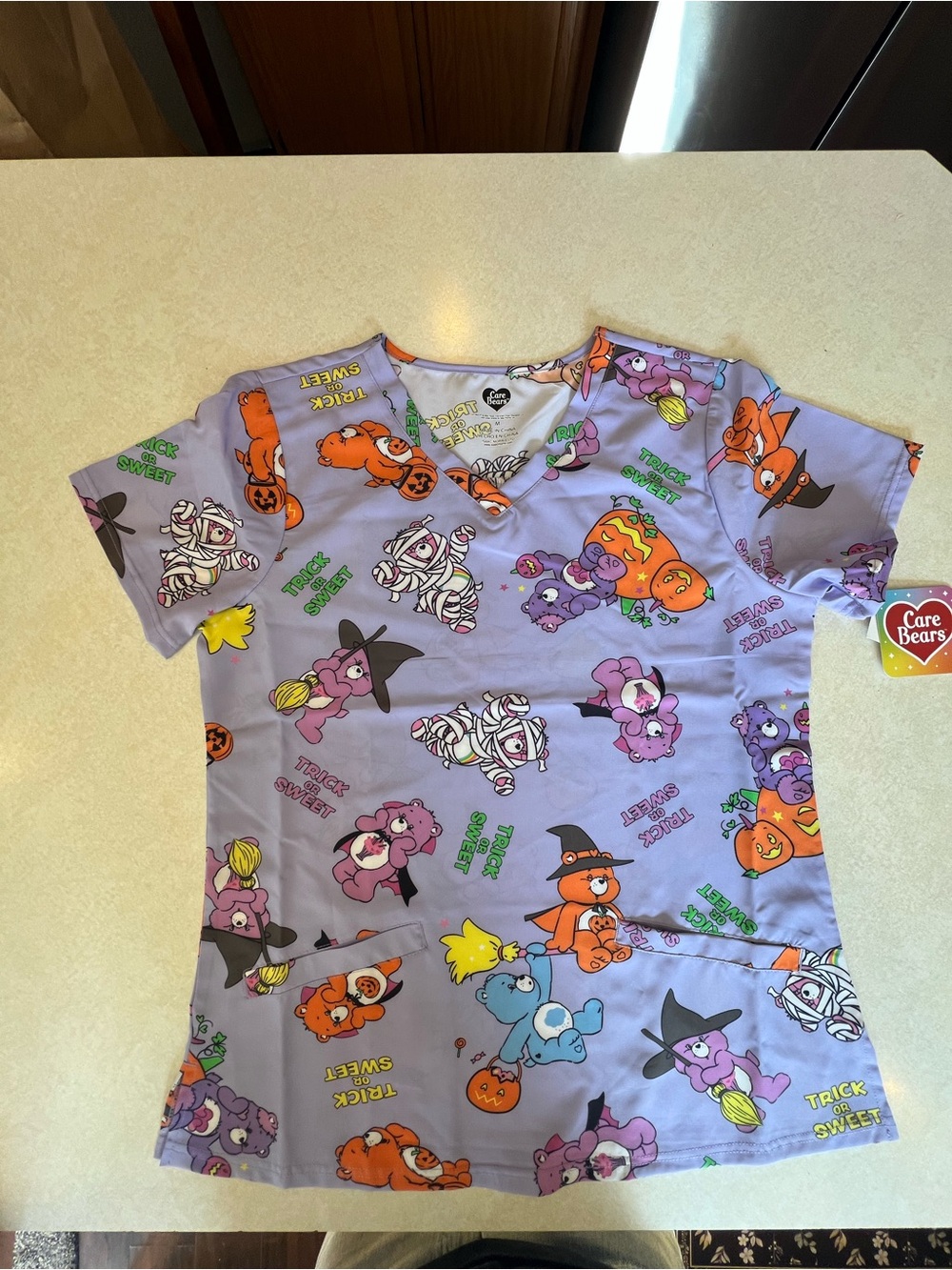 Care Bears Lavender Halloween Scrub Top🎃